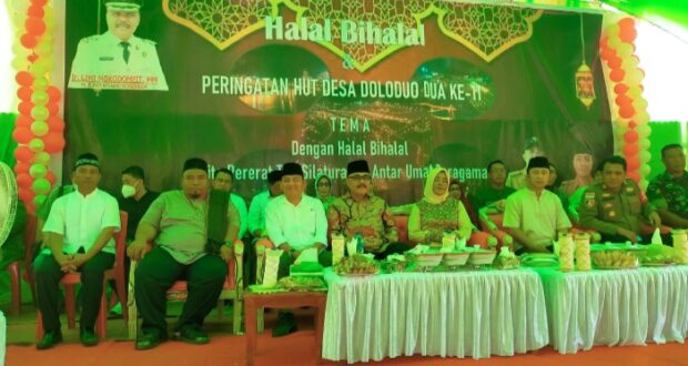 Pj Bupati Bolmong Hadiri Halal Bi Halal Sekaligus Perayaan Hut Desa